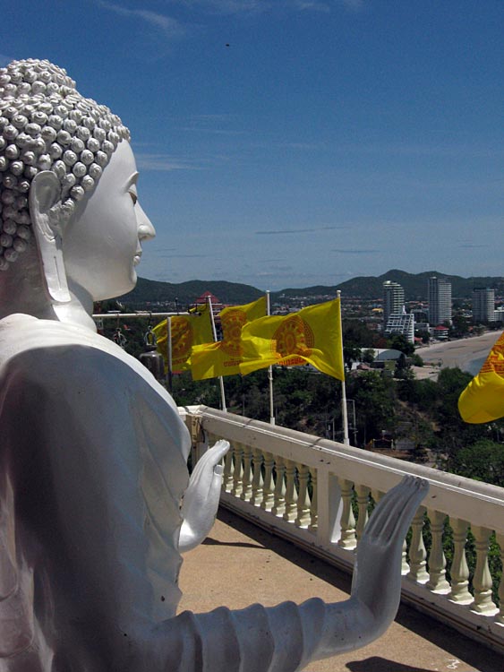 Buddha Image at Khao Takiab temple with view towards Hua Hin